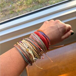 Vibrant Pura Vida bracelet collection. Multicolor String Bracelet. 12 bracelets